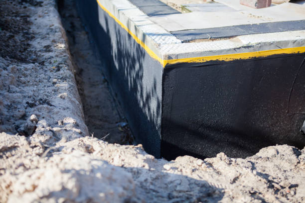 Professional Waterproofing technician working in Russia, OH